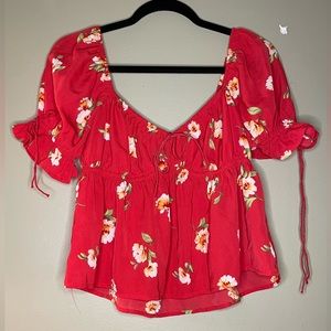 red/orange floral top